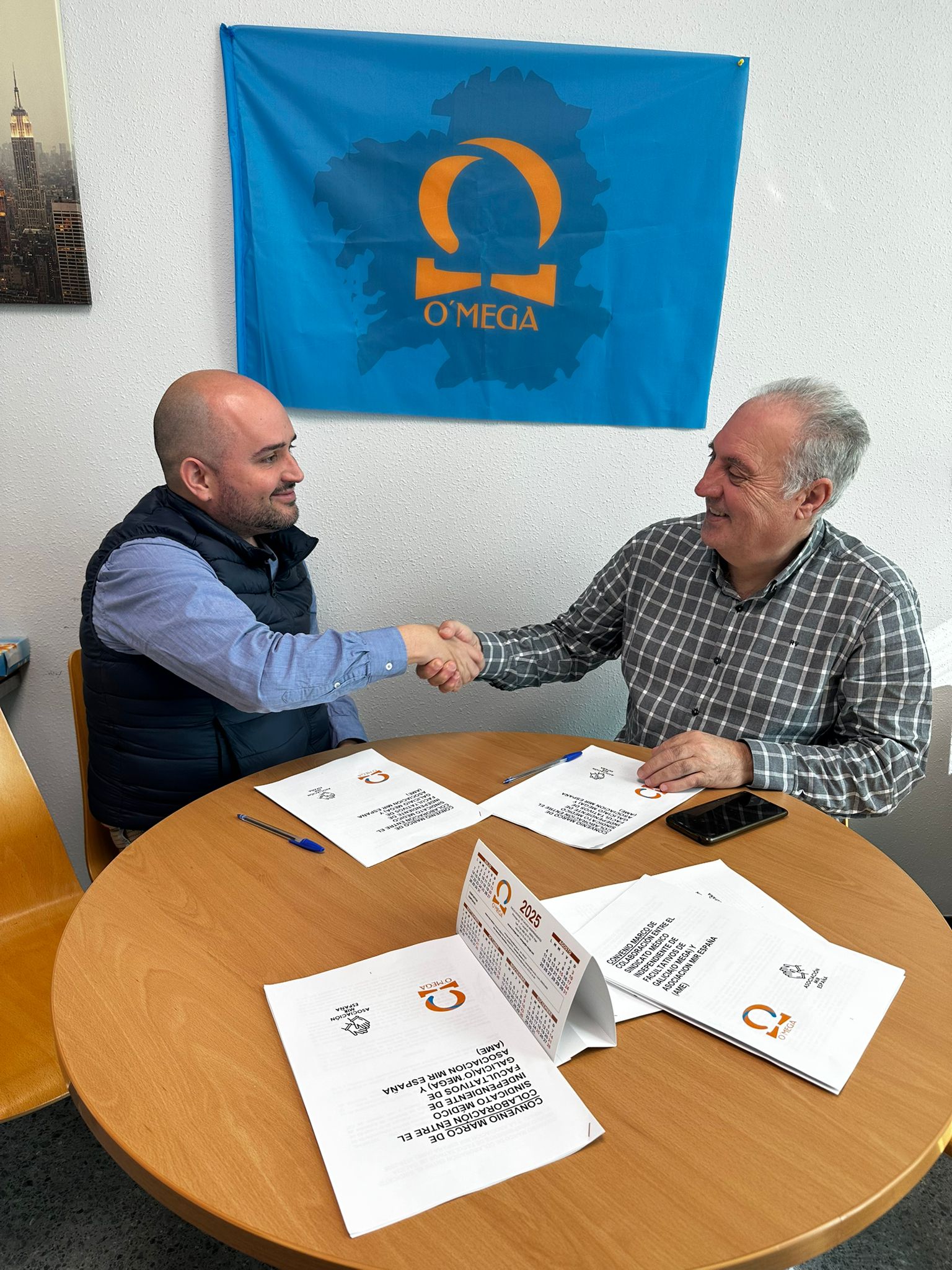 O’MEGA Y AME (Asociación MIR España) firman un acuerdo de colaboración